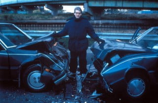 Cronenberg sul set di Crash, tratto da un romanzo di Ballard