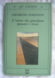 Copertina di L'uomo che guardava passare i treni di Simenon