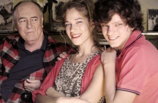 Il cast con Bertolucci
